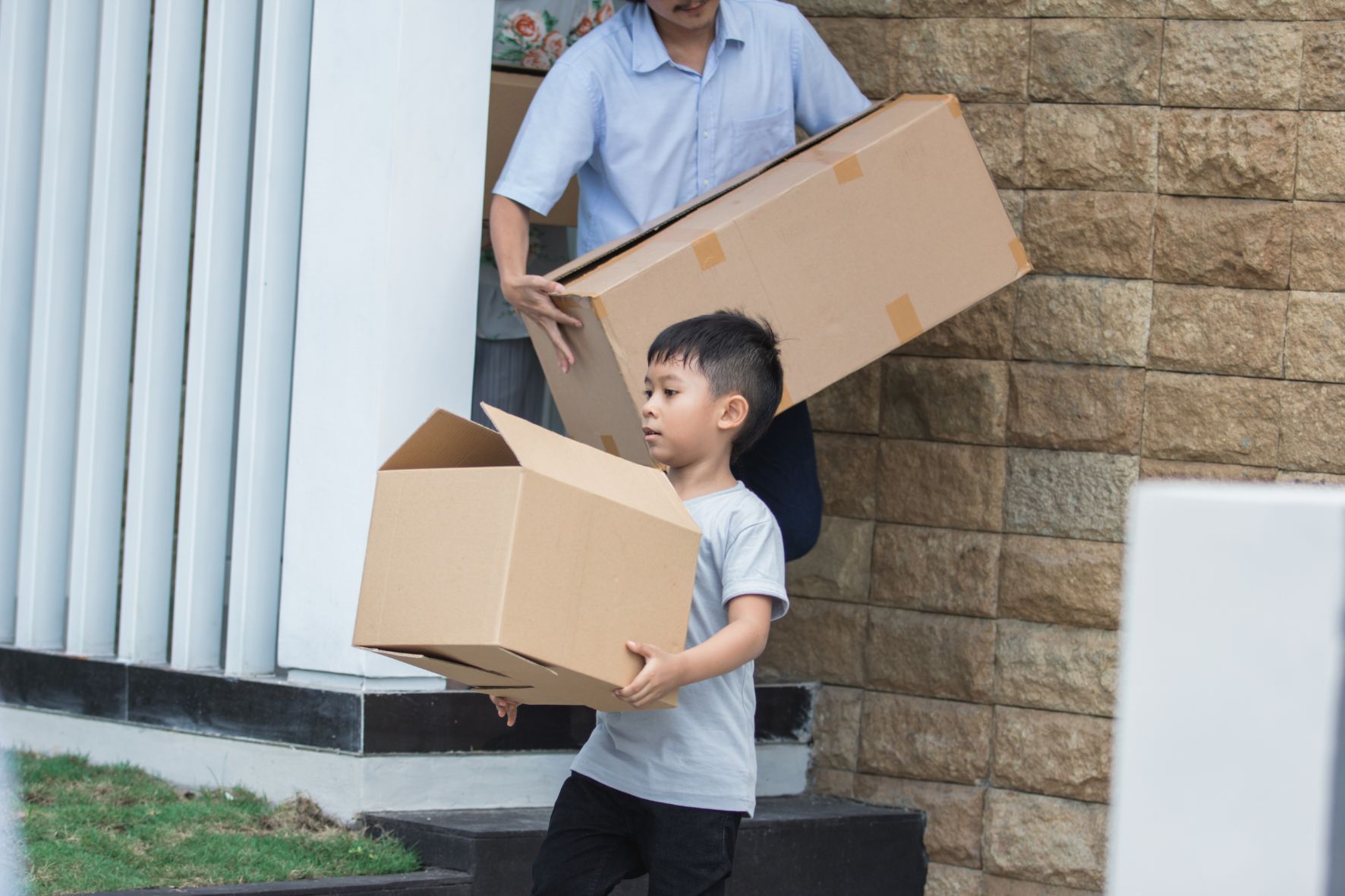 father and son moving house