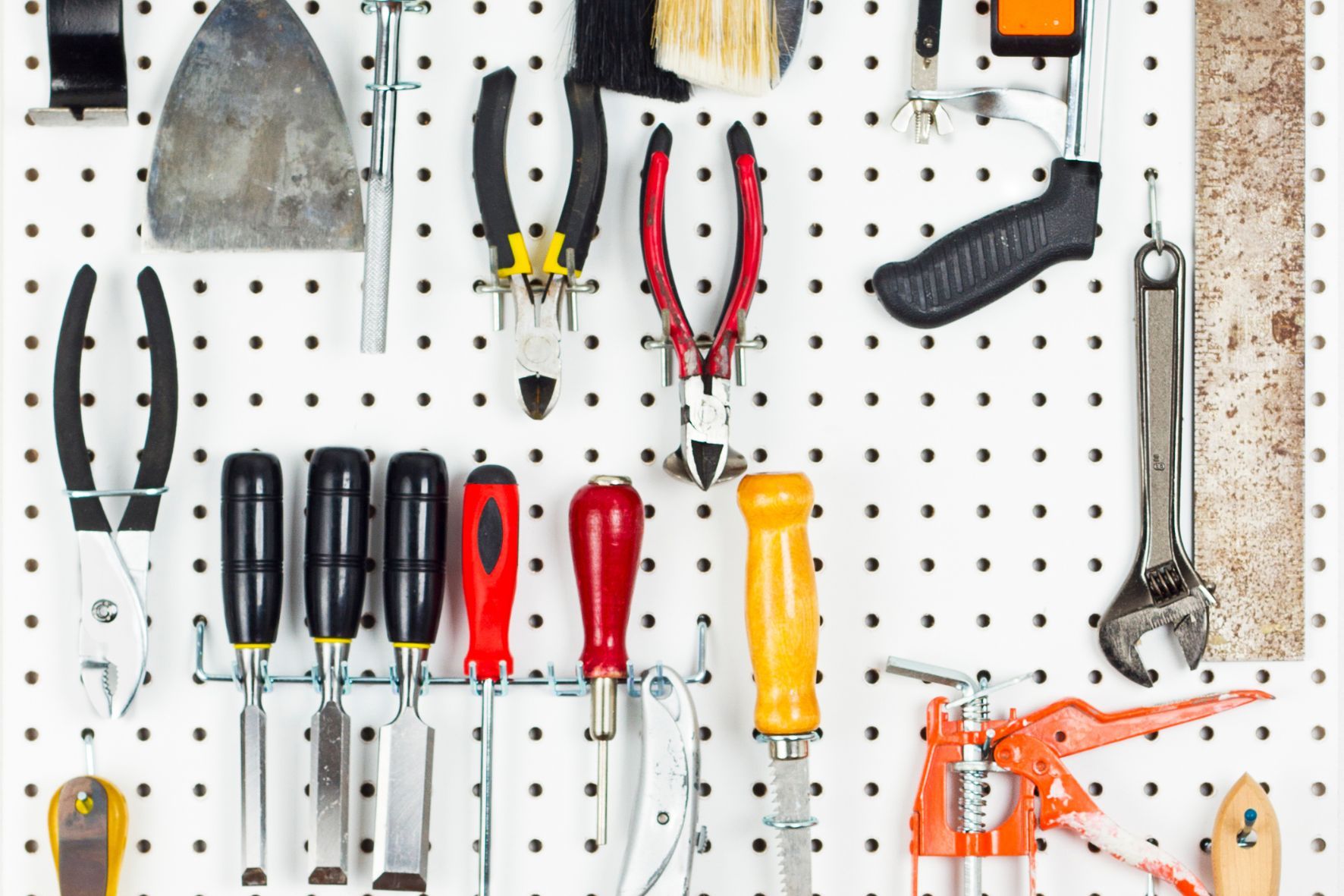 Tools organised on a pegboard