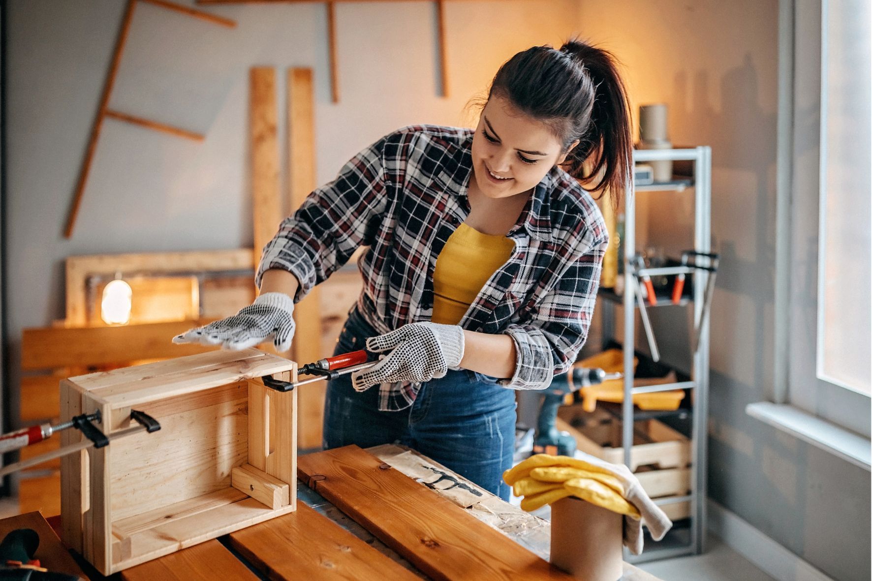 woman doing DIY with organised tool kit