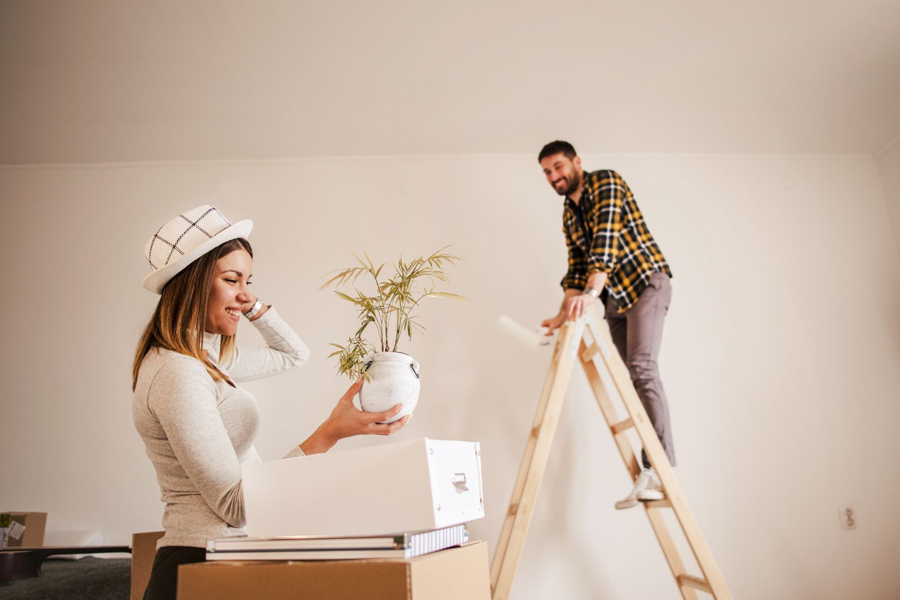 Couple unpacking in new home