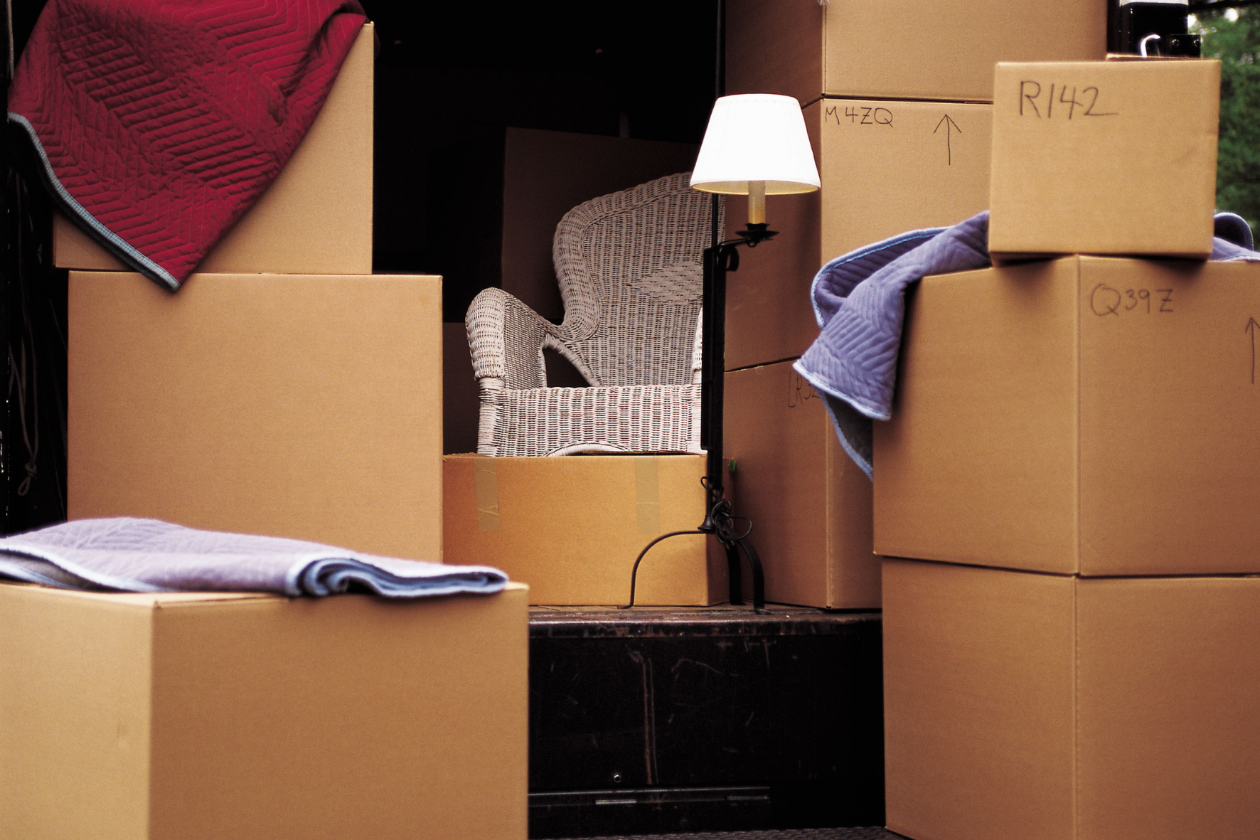 Boxes and furniture stacked up ready for storage