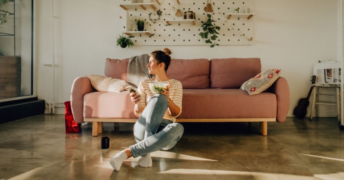 person enjoying a coffee alone at home