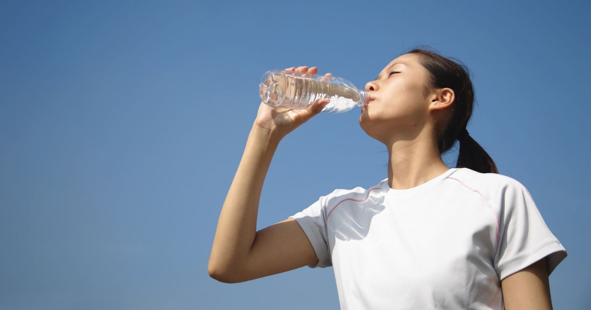 Person drinking water after moving house - MyStackBox Person drinking water after moving house
