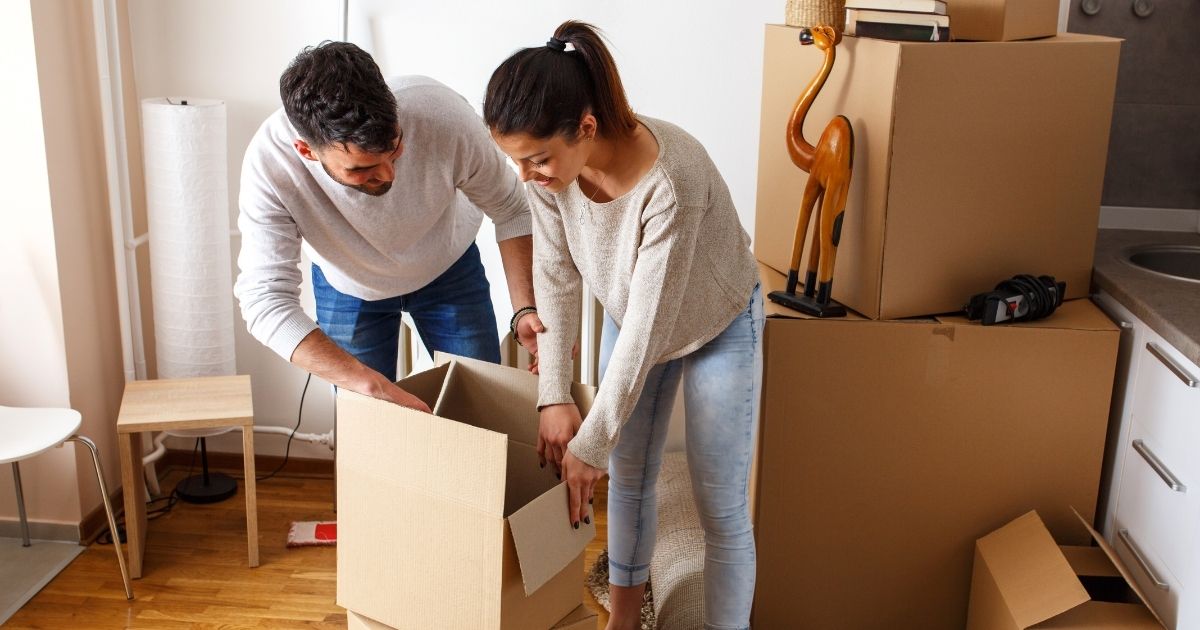 People packing for moving house